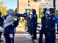 Police with batons approach Israel-Hamas war protesters at UC Santa Cruz