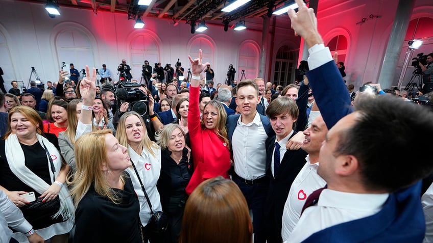 polish exit polls signal conservative partys ouster after 8 years in power