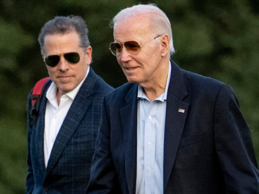 FILE - President Joe Biden, and his son Hunter Biden arrive at Fort McNair, June 25, 2023,