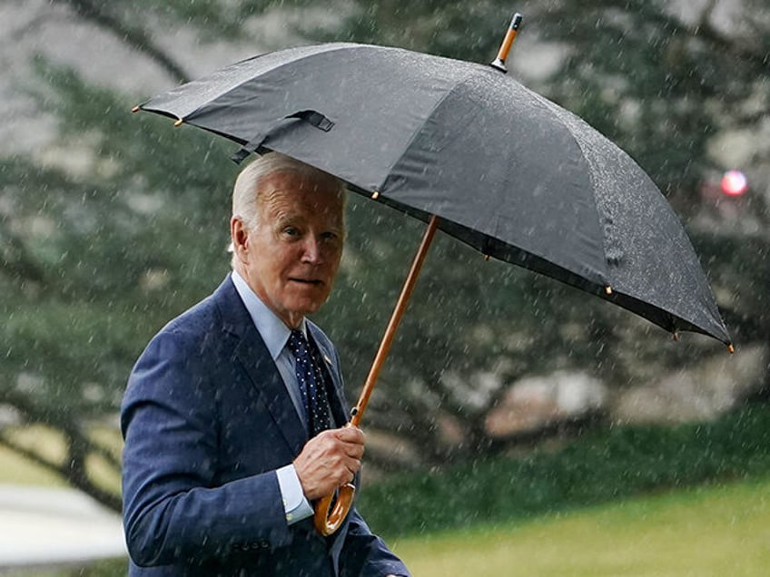 joe-biden-umbrella-rain-getty