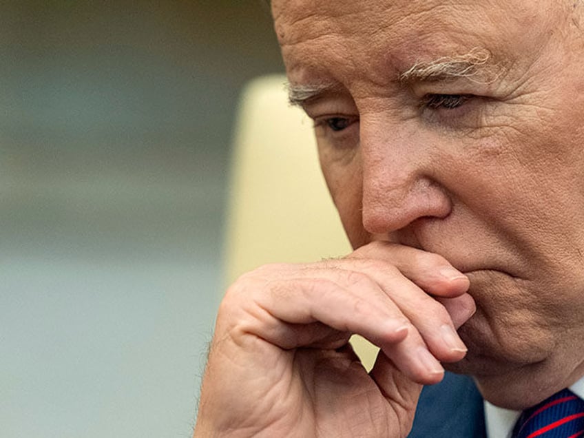 President Joe Biden listens as he meets with Iraq's Prime Minister Shia al-Sudani in