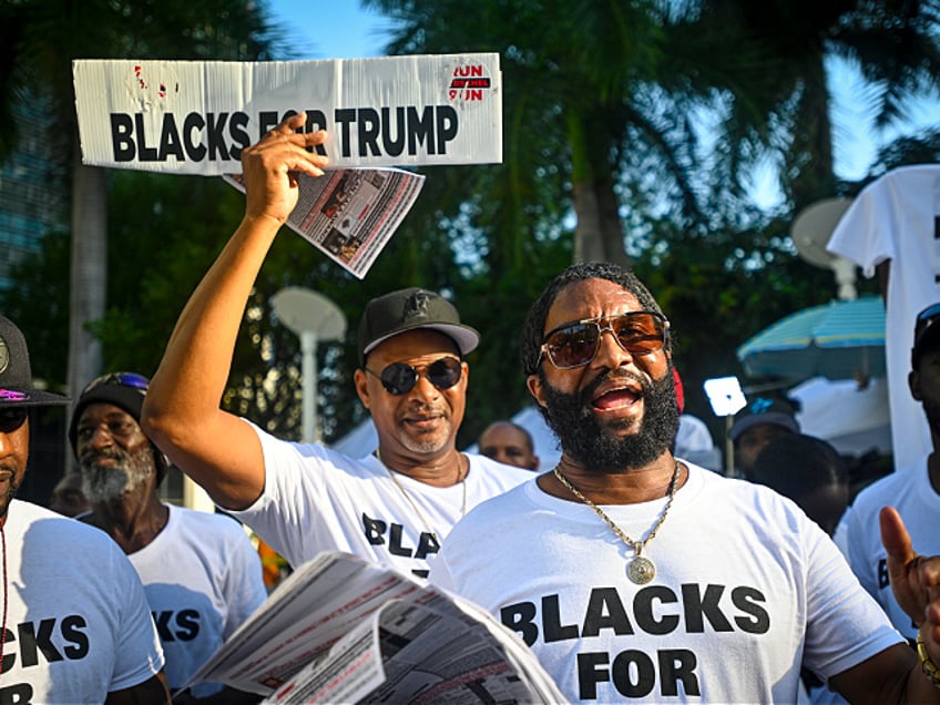 MIAMI, FLORIDA - JUNE 13: A Trump supporters gather outside the Wilkie D. Ferguson Jr. United States Federal Courthouse after Trump's arraignment concluded on June 13, 2023 in Miami, Florida. Trump pleaded not guilty to criminal charges that he mishandled top secret classified information and obstructed justice after leaving the White House. (Photo by Miguel J. Rodríguez Carrillo /Getty Images)