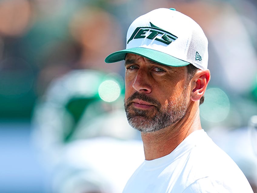 Aaron Rodgers #8 of the New York Jets looks on against the Washington Commanders during the preseason game at MetLife Stadium on August 10, 2024 in East Rutherford, New Jersey. The Jets defeated the Commanders 20-17. (Photo by Mitchell Leff/Getty Images)