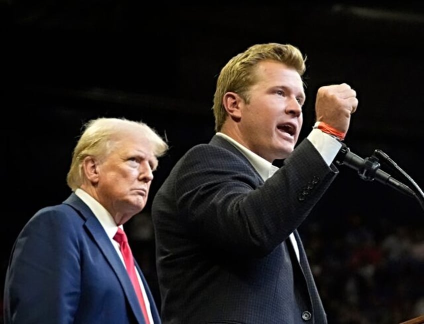 Republican presidential nominee former President Donald Trump listens as Montana Senate ca