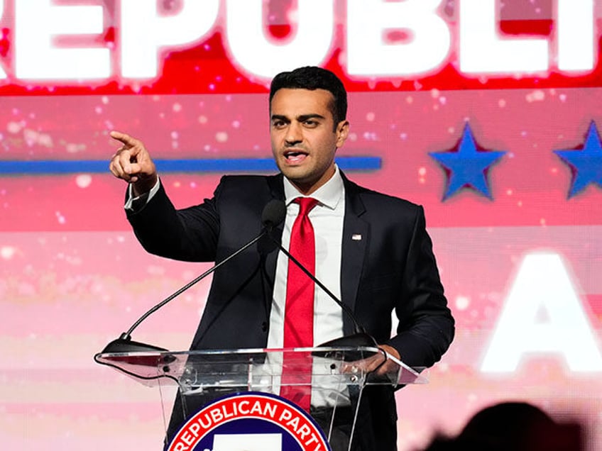 Abe Hamadeh, Republican candidate for state attorney general, talks to his supporters at the Republican watch party in Scottsdale, Ariz., Tuesday, Nov. 8, 2022. (AP Photo/Ross D. Franklin)