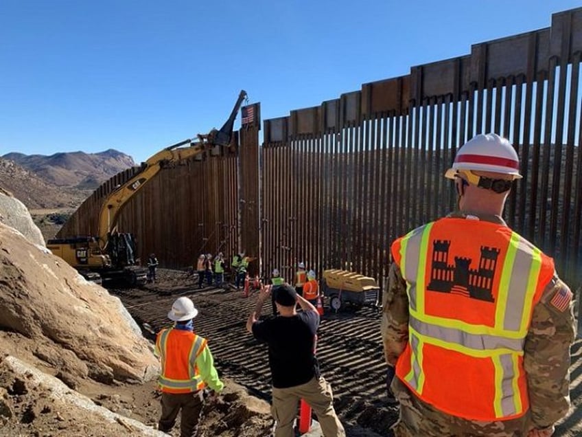 Final installation of the now completed 450 miles of new border wall systems. (Photo: U.S.