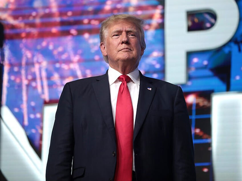 Former President of the United States Donald Trump speaking with attendees at the "Rally t