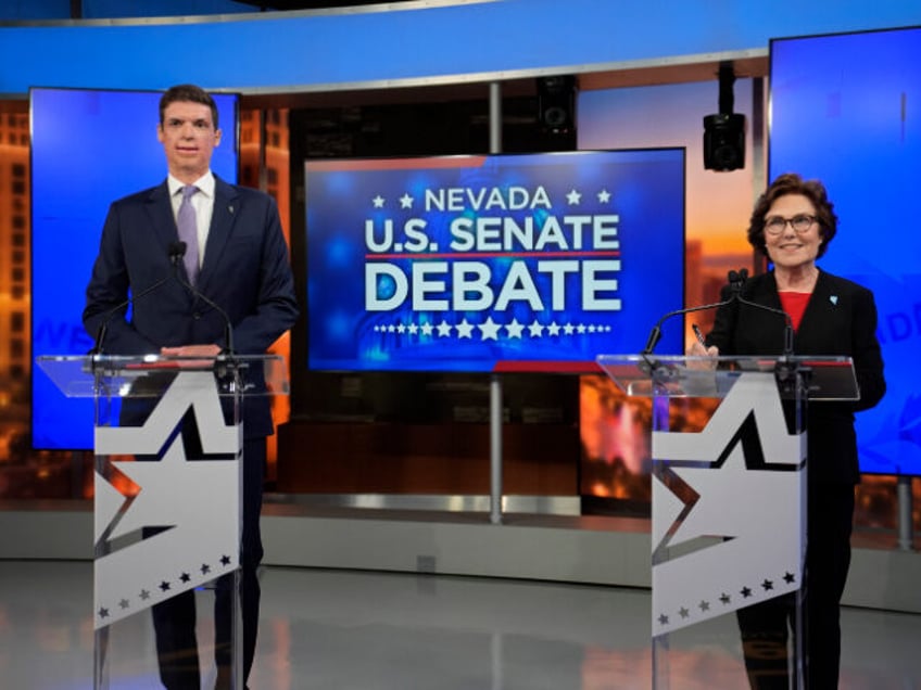 Republican senatorial candidate Sam Brown, left, and Sen. Jacky Rosen, D-Nev., stand in a