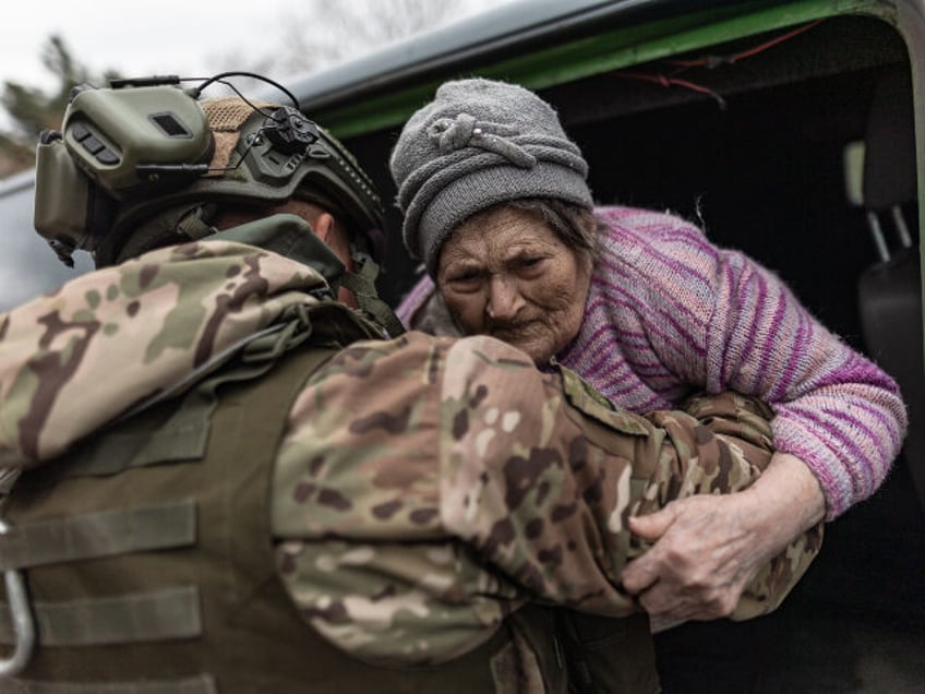 MYRNOGRAD, UKRAINE - NOVEMBER 18: 89 year-old Tamara Dmitrievna, is being evacuated by the