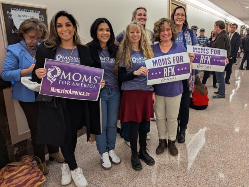 Chana Walker (3rd L) poses with members of "Moms for America" at the US Senate o