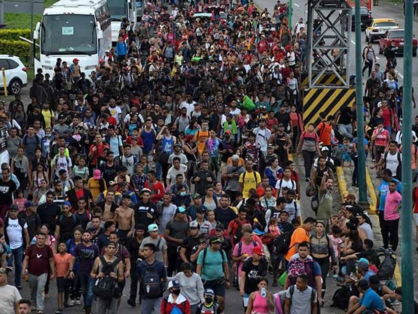 Latin American migrants take part in a caravan towards the border with the United States,