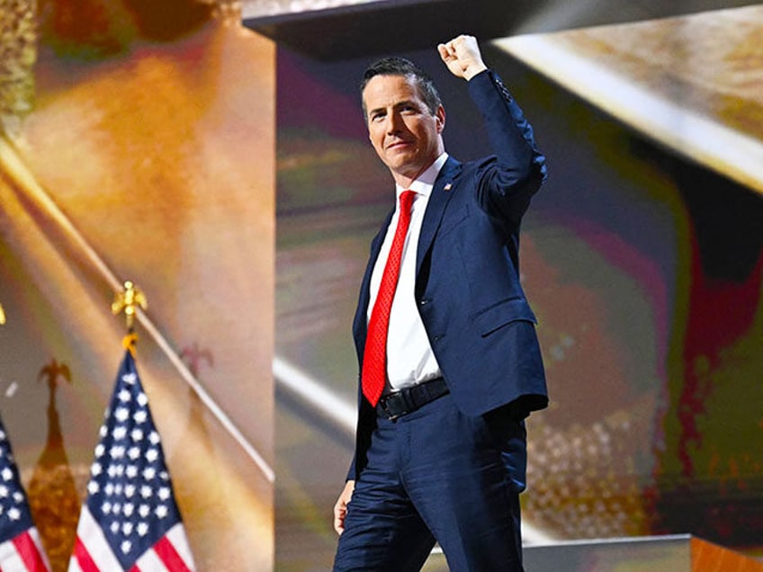 Colombian-US businessman Bernie Moreno gestures as he arrives onstage to speak during the