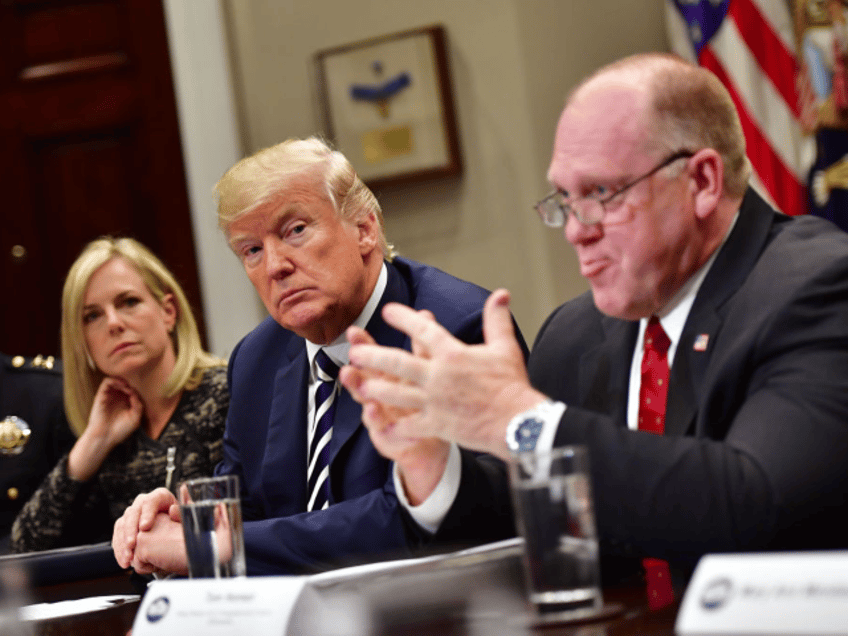 WASHINGTON, DC - MARCH 20: President Donald Trump (C) holds a law enforcement roundtable o