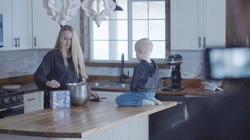 Rachel Blackmore in the kitchen preparing a meal for her son