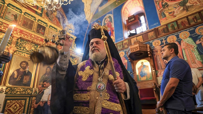 Greek Orthodox Saint Porphyrius Church holds funeral for those killed in an apparent Israeli strike