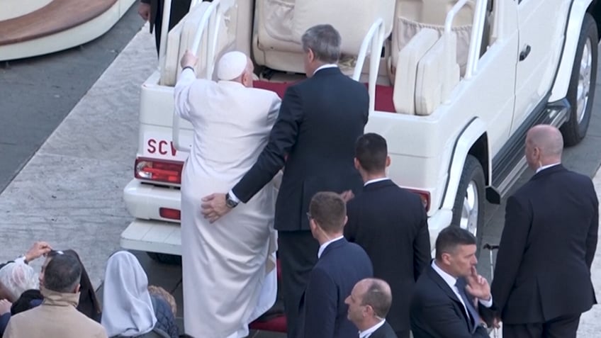 Pope Francis near popemobile