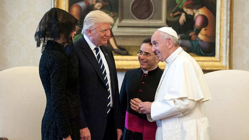 Donald Trump and Pope Francis share a laugh