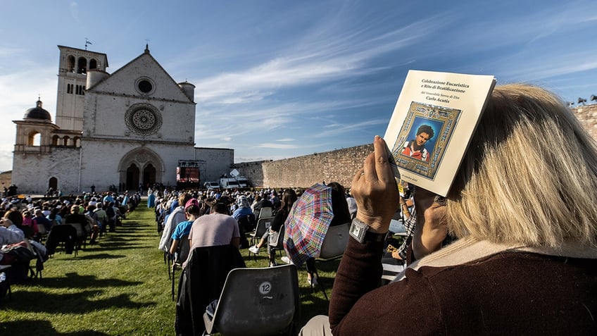 People outside at a Mass