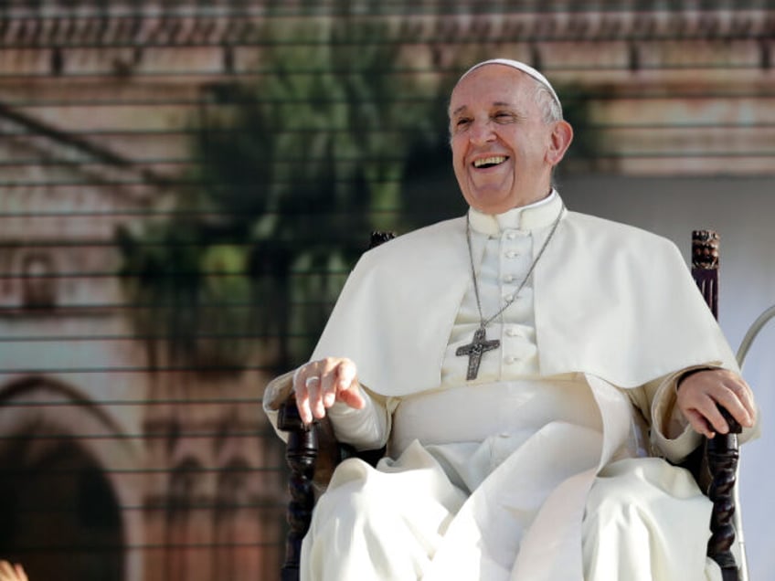 Pope Francis laughs during a meeting with youths in Piazza Politeama, in Palermo, Italy, S