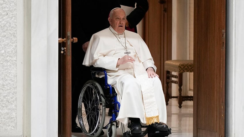 Pope Francis in a wheelchair