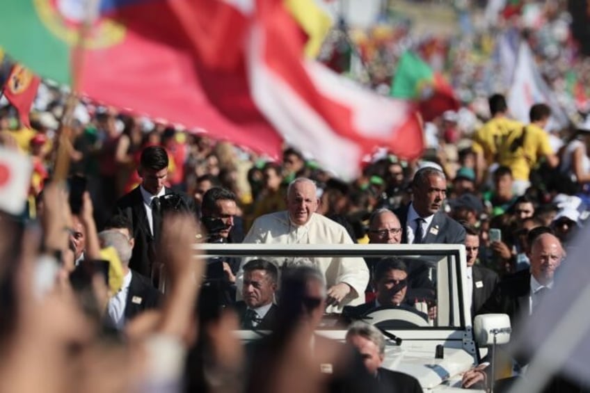 pope presides way of cross ceremony at youth festival