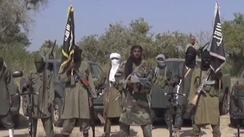 Oct. 31, 2014 - FILE photo of members of Nigeria's Islamic extremist group Boko Haram, Islamic extremists from Nigeria attacked a border town inside Niger, marking the 2nd foreign country attacked by the group in several days.