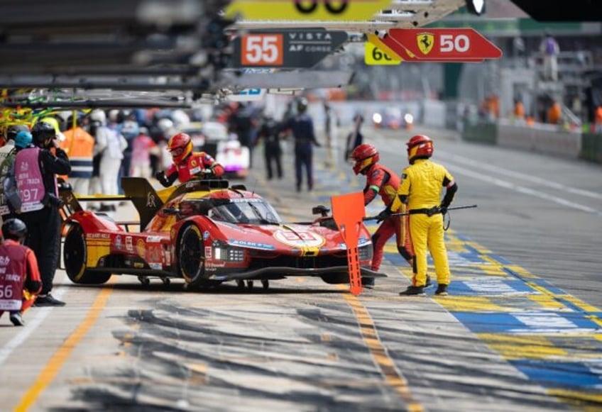 Ferrari, aiming for back-to-back wins, in the pits during Thursday qualifying at Le Mans