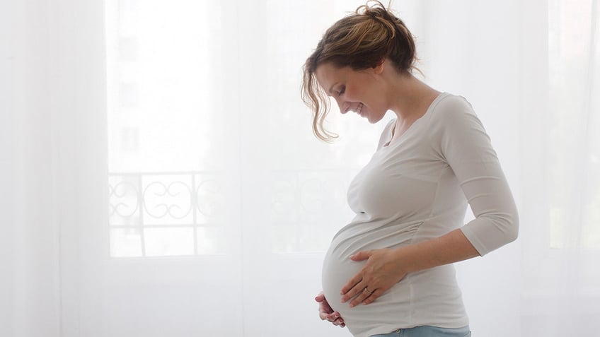 pregnant woman smiling