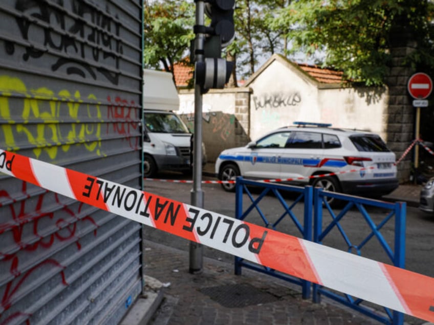 Police cordon off the area of a house where an adult and four children were found dead on October 3, 2020 in the Paris' popular suburb of Noisy-le-Sec, in what could be a family tragedy with still unclear circumstances. - Three other adults were seriously injured, including the alleged perpetrator, …