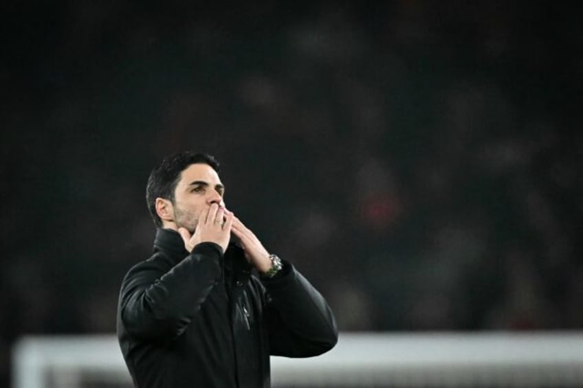 Arsenal manager Mikel Arteta celebrates victory against Tottenham