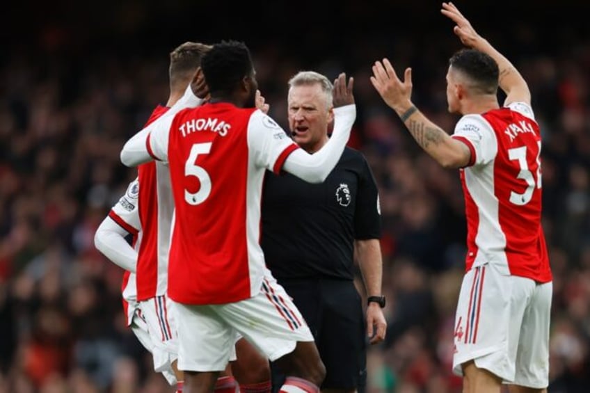 premier league to clamp down on players harassing referees