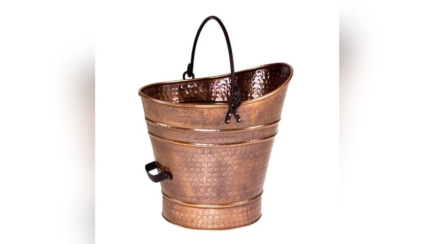 A copper ash bucket at Lowe’s lets you remove and store ashes safely with a decorative touch.