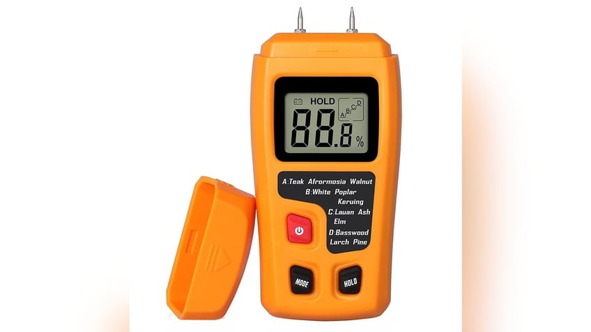 A moisture meter like this at Walmart helps ensure your wood is properly dried and seasoned for efficient burning.