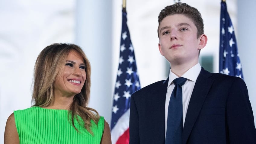 Melania Trump smiling at Barron Trump