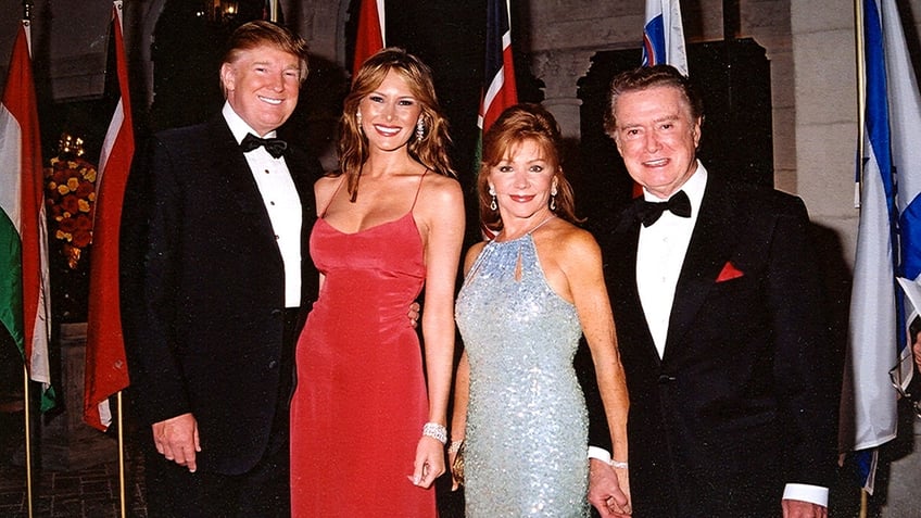 Group portrait of, from left, the Trumps and TV hosts Joy and Regis Philbin as they pose together at the Mar-a-Lago estate, Palm Beach, Florida, 2005.