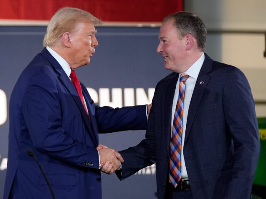 Republican presidential nominee former President Donald Trump greets Lee Zeldin as he arri