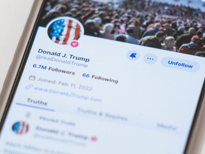 FILE - The Truth Social account for former President Donald Trump is seen on a mobile devi