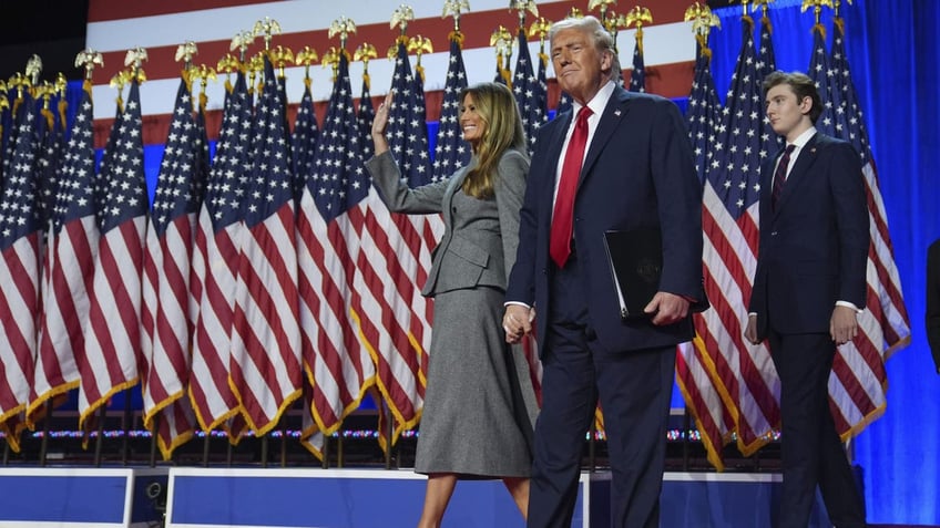 Donald and Melania Trump greet guests at Mar-a-Lago