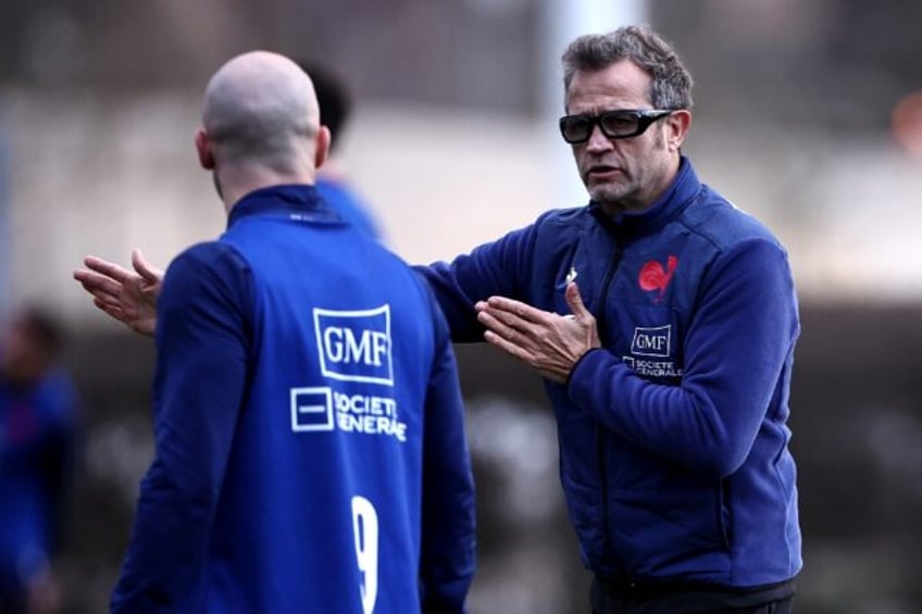 Fabien Galthie speaks to Maxime Lucu during a training session on Tuesday