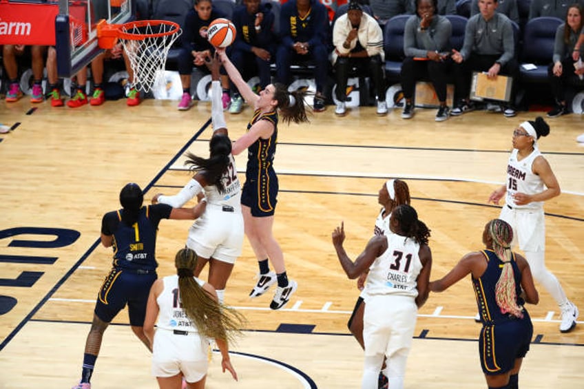 Caitlin Clark of the Indiana Fever goes to the basket during the game against the Atlanta Dream during the WNBA preseason game on May 9, 2024 at...