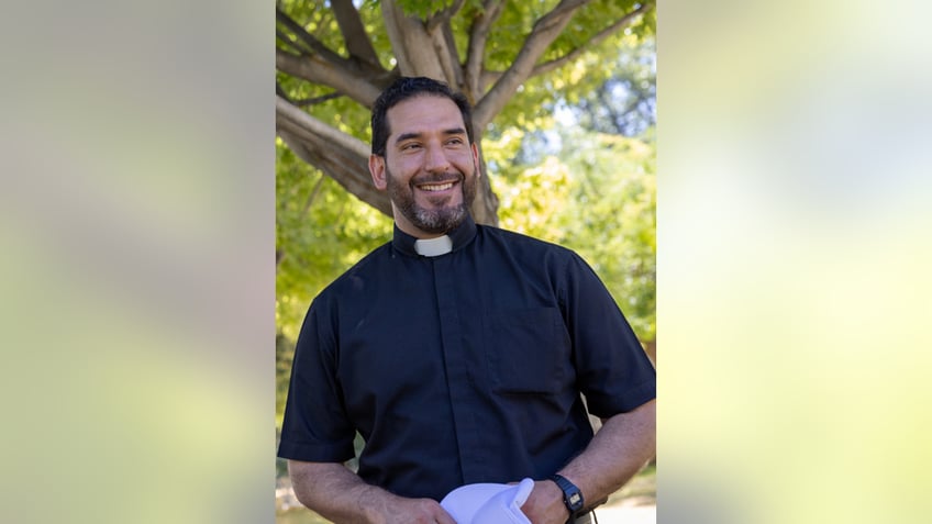 priest jumps into action to help woman deliver twin babies outside cathedral surreal