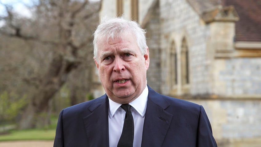 Prince Andrew speaking outside a church.