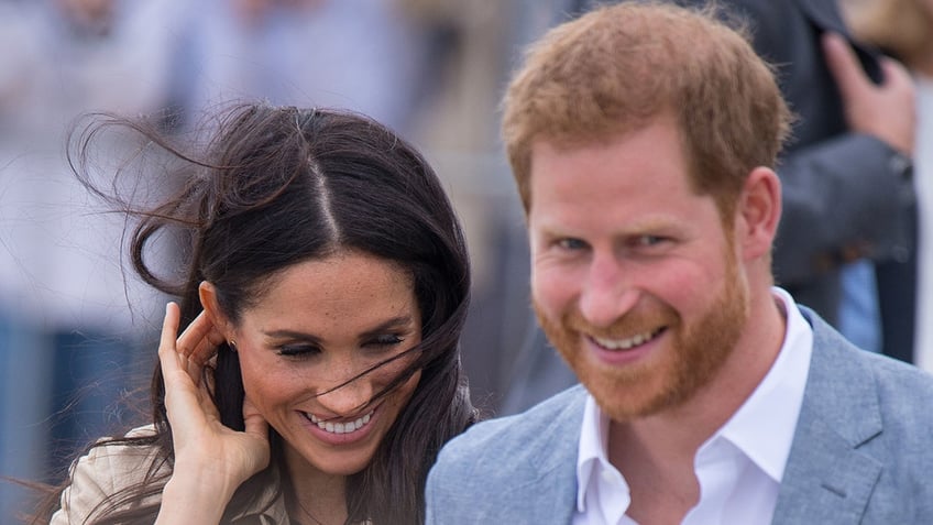 A close-up of Prince Harry and Meghan Markle smiling