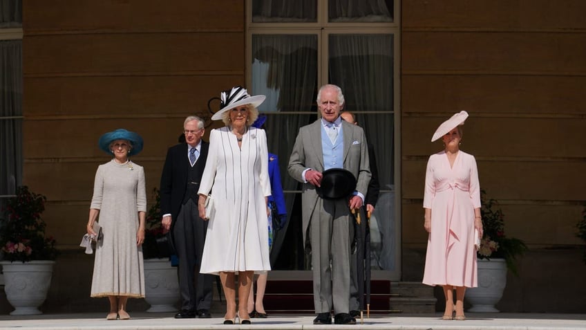 royal family posing at garden party