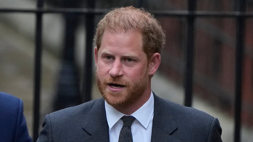 prince harry concerned for meghan markles safety tells uk court i cannot put my wife in danger