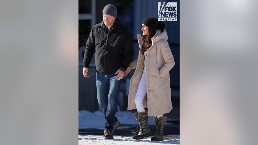 Harry and Meghan walking and holding hands