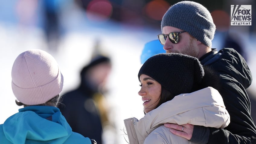 Prince Harry and Meghan Markle attend a training session for competitors in the Invictus Games