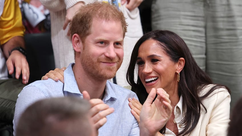 prince harry meghan markle pack on pda as they celebrate dukes 39th birthday at invictus games