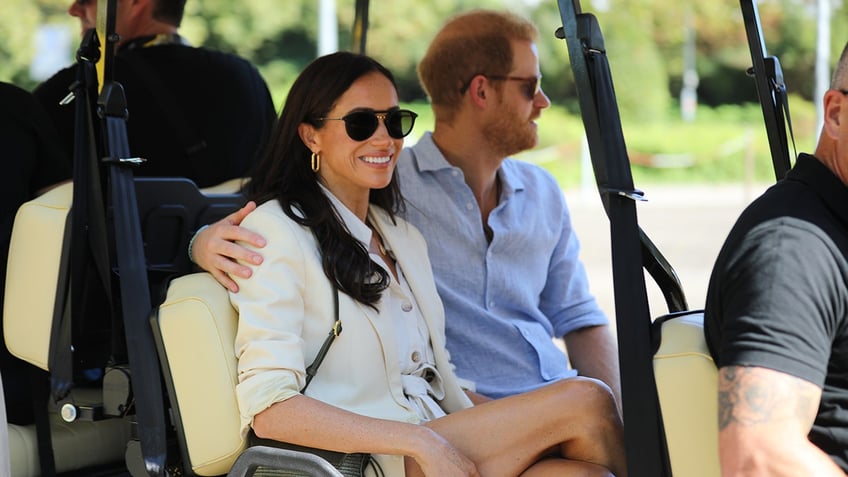 prince harry meghan markle pack on pda as they celebrate dukes 39th birthday at invictus games