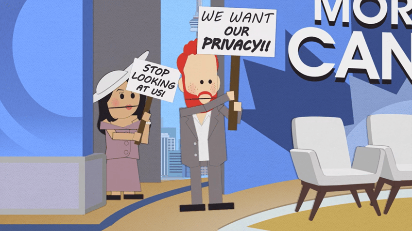 The Prince with red hair and his wife with black hair and an oversized white hat carry signs that say "Stop looking at us" and "We want our privacy!!!" during an episode of "South Park"